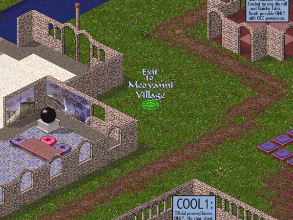 An empty patch of grass behind the hall